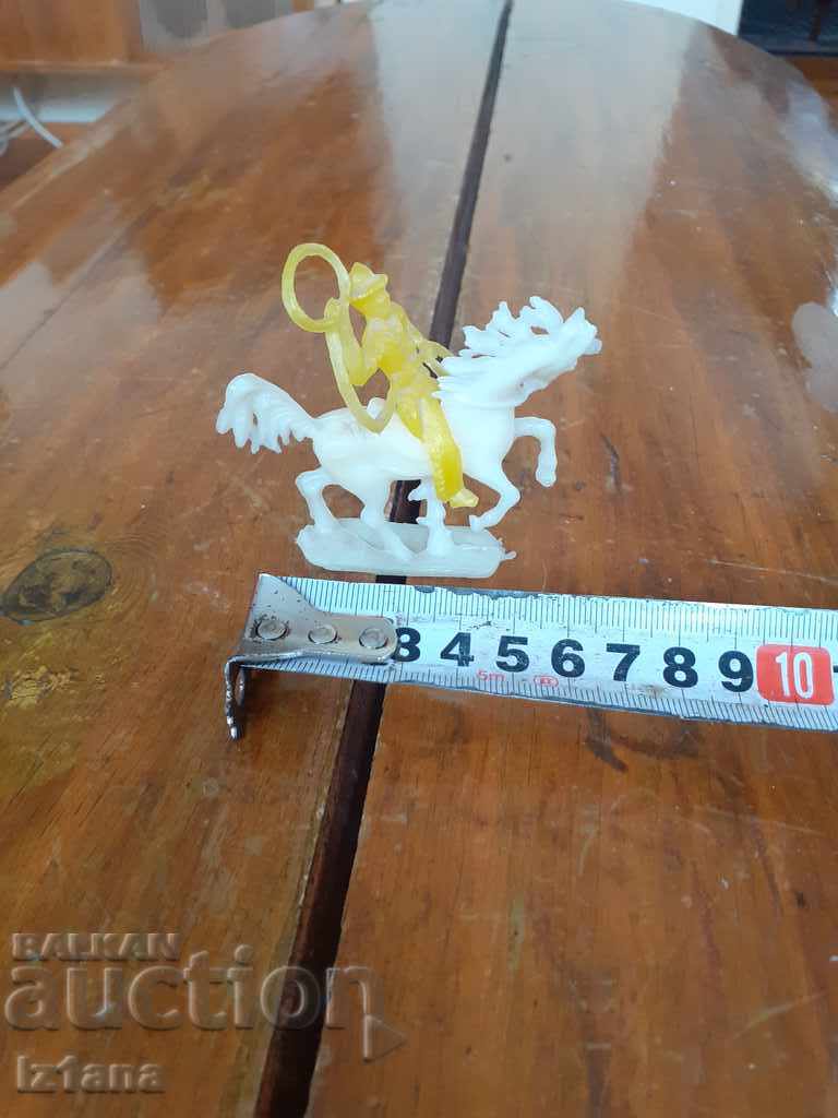 Auction An old Cowboy figurine Auction An old Cowboy figurine