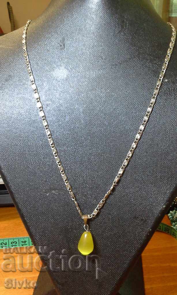 Necklace with a yellow stone pendant