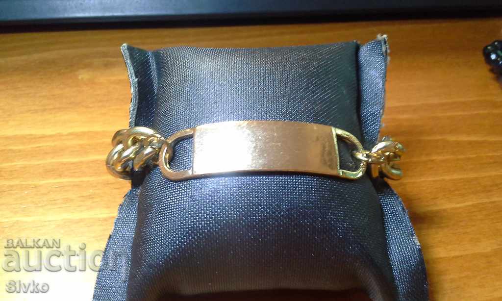 Bracelet with chain and plate for inscription