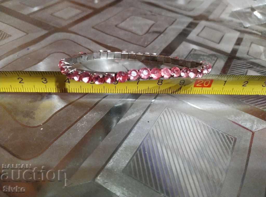 Grivna (currency) with pink pebbles Grivna (currency) with pink pebbles