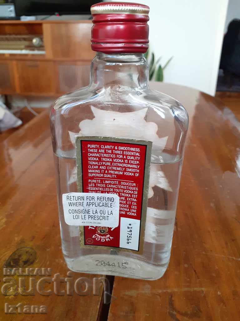 Auction Old bottle of Vodka Troika Auction Old bottle of Vodka Troika
