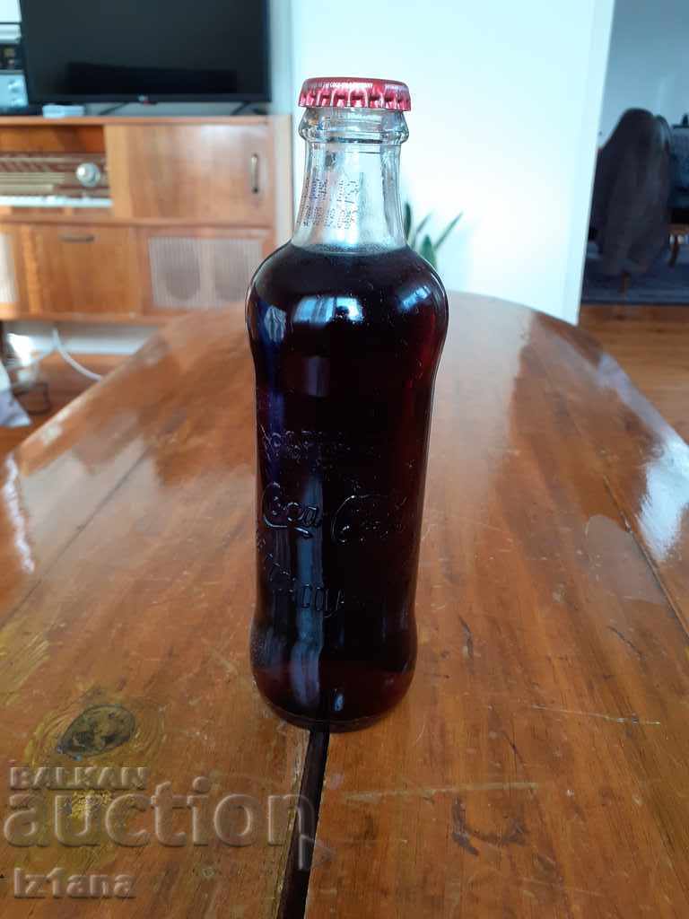 Sticlă veche de Coca Cola, Coca Cola