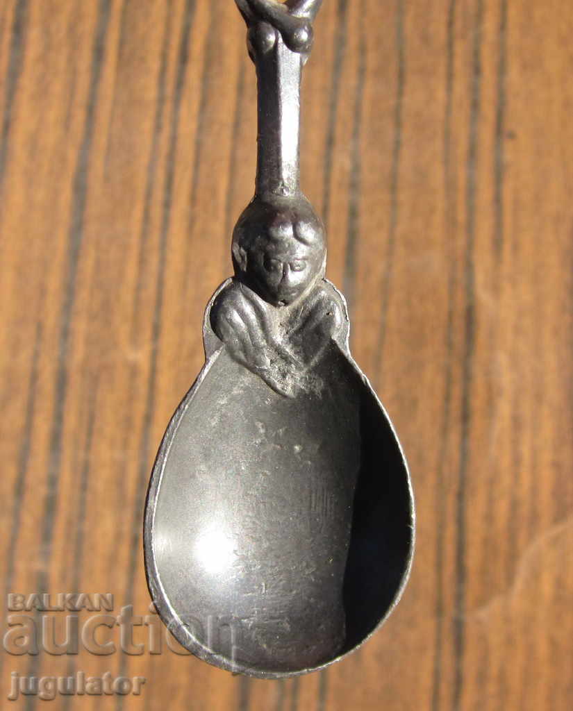 Delivery of Bulgarian Revival ritual tin spoon with a saint Delivery of Bulgarian Revival ritual tin spoon with a saint