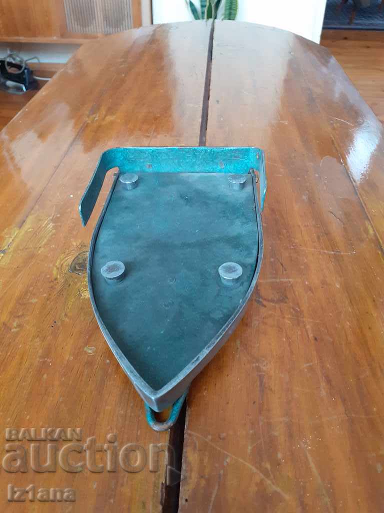 An old iron stand with price 20.00 BGN | € 10.23 An old iron stand with price 20.00 BGN | € 10.23