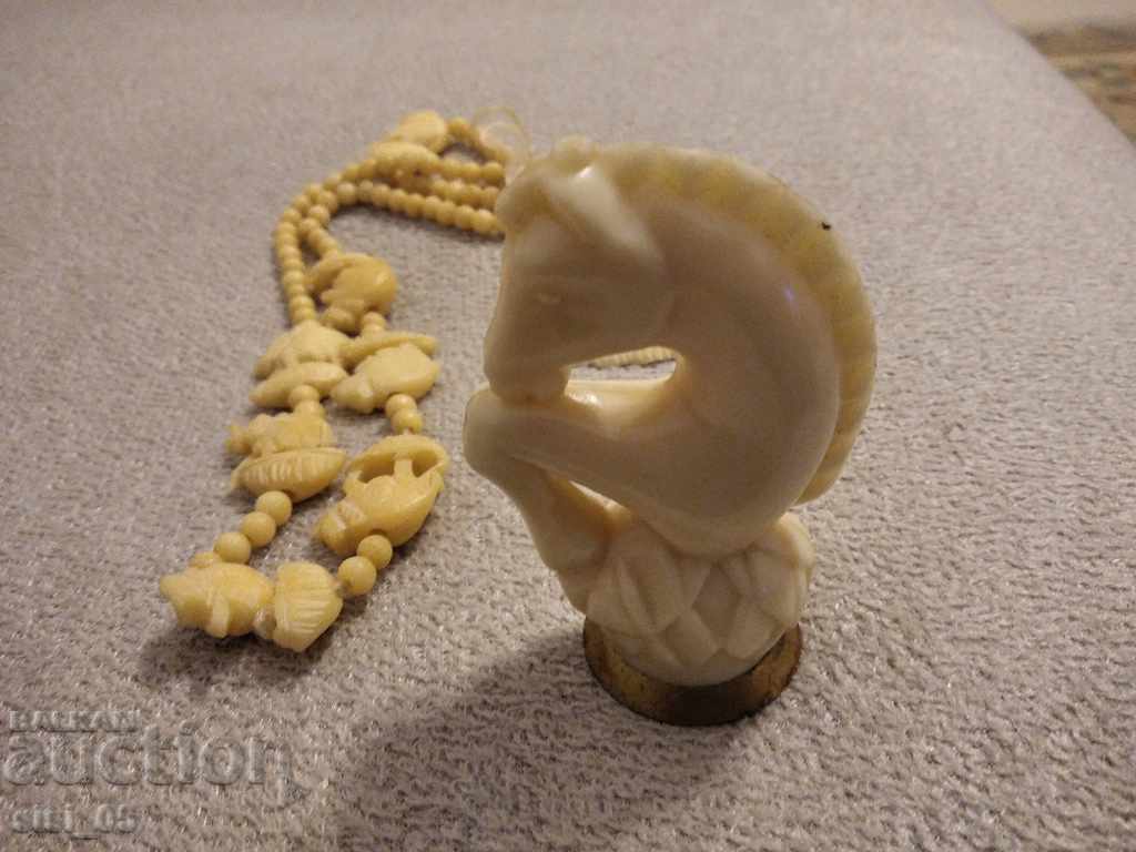 Auction  Necklace, ivory figures, bone