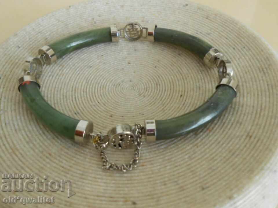 Hryvnia with natural Jade, elements with blessing Hryvnia with natural Jade, elements with blessing