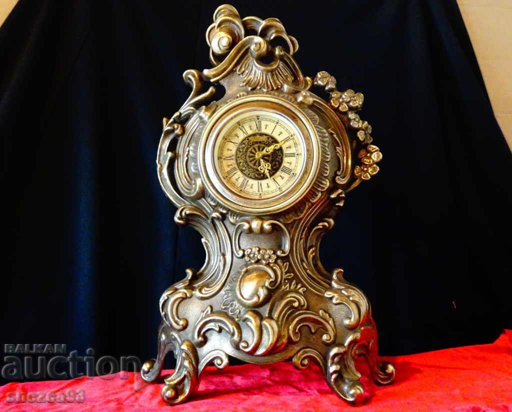 Bronze mechanical fireplace clock, baroque.
