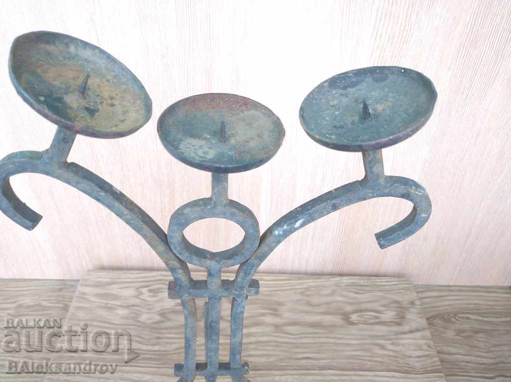 An old forged candlestick with price 25.00 BGN | € 12.78 An old forged candlestick with price 25.00 BGN | € 12.78