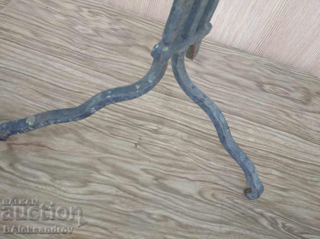 Delivery of An old forged candlestick Delivery of An old forged candlestick