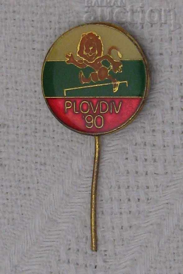 HUMP RUNNING LION ATHLETICS PLOVDIV 1990 BADGE with price 3.00 BGN | € 1.53