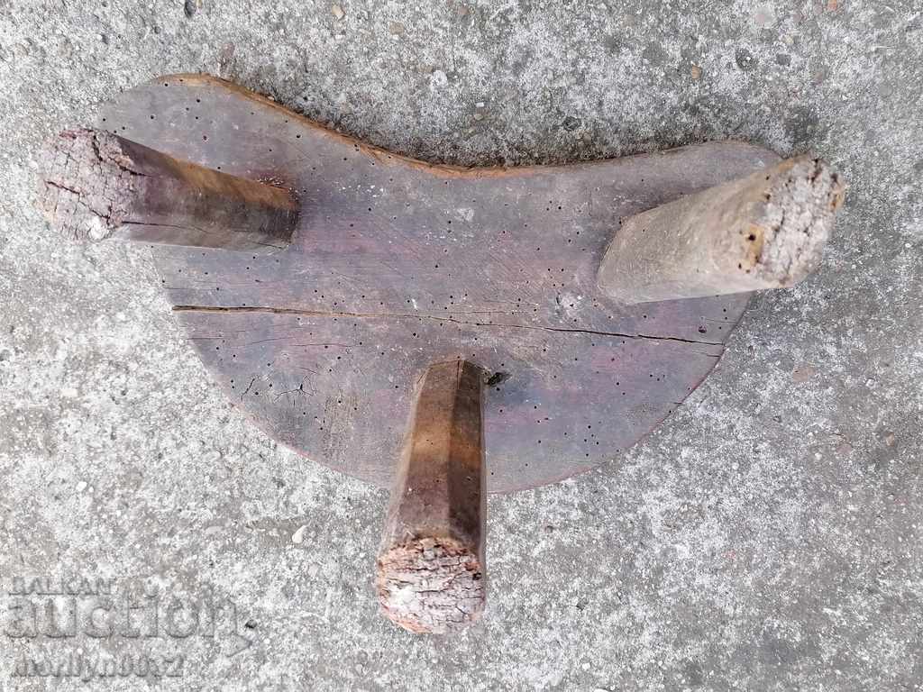 Delivery of Old three-legged stool, chair, wooden, primitive Delivery of Old three-legged stool, chair, wooden, primitive