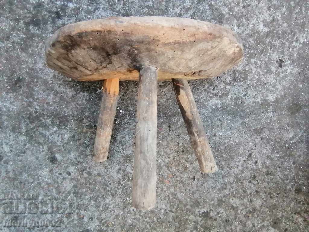 Delivery of Old three-legged stool, chair, wooden, primitive Delivery of Old three-legged stool, chair, wooden, primitive
