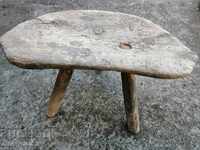 Old three-legged stool, chair, wooden, primitive