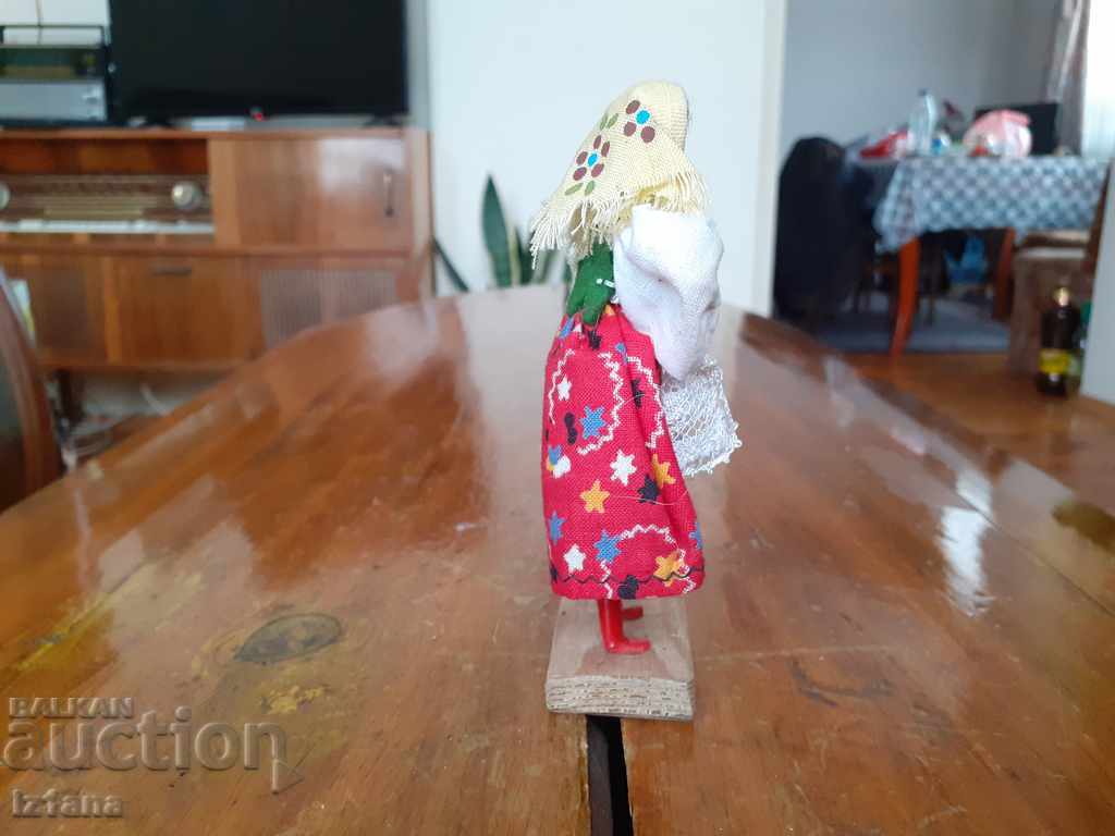 Delivery of An old folk figurine, a souvenir