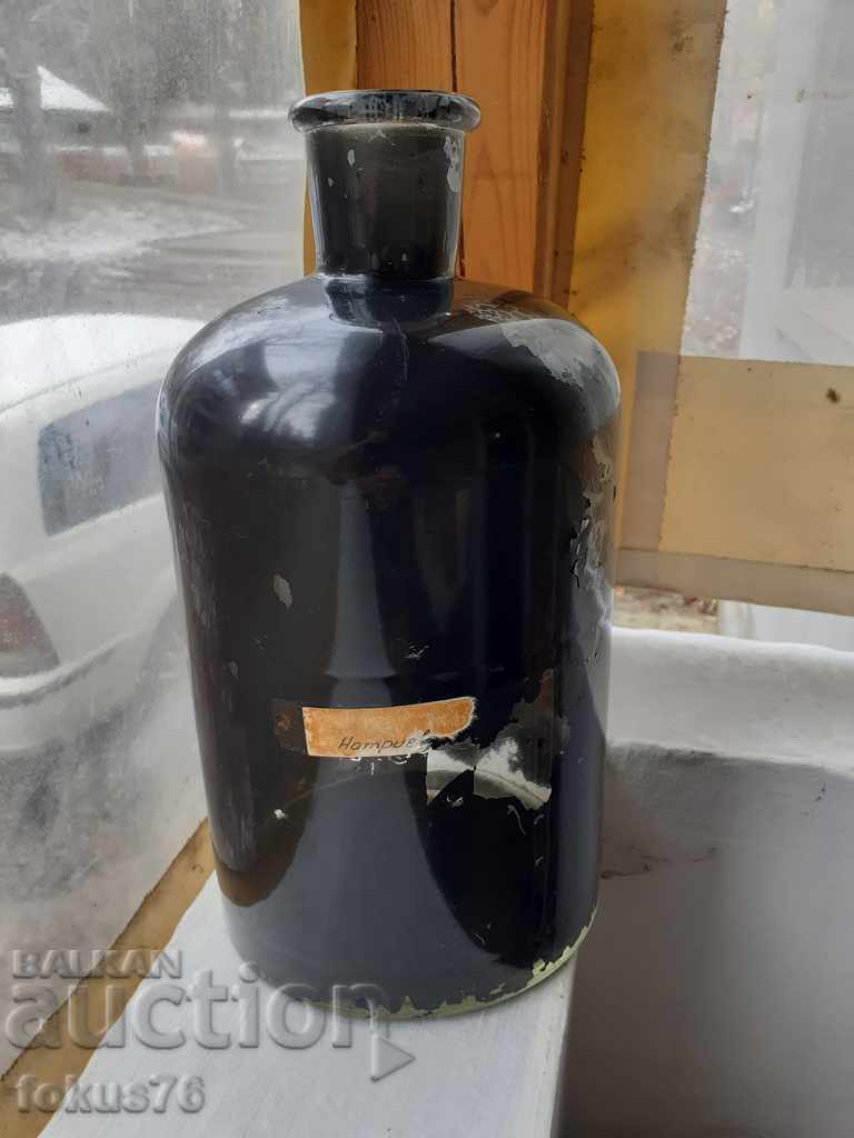 Old medical jar painted black