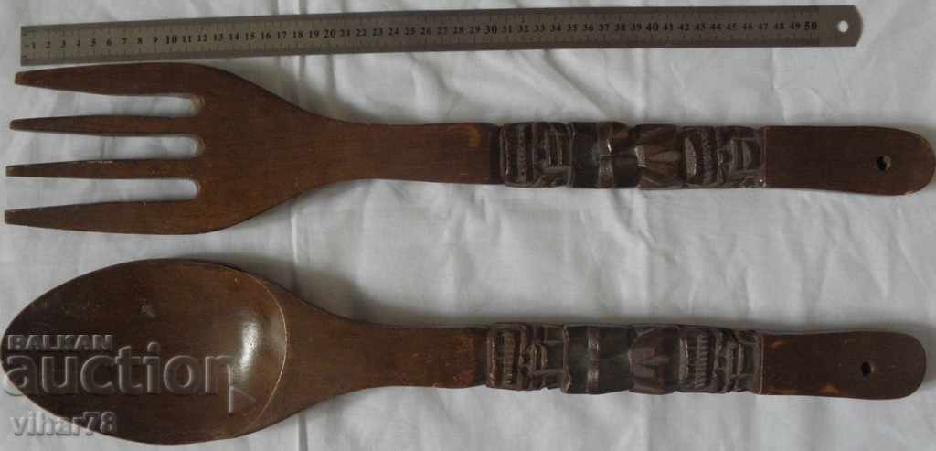 Auction an old wooden fork and a wall spoon Auction an old wooden fork and a wall spoon