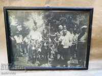 Old picture people on donkeys with a frame