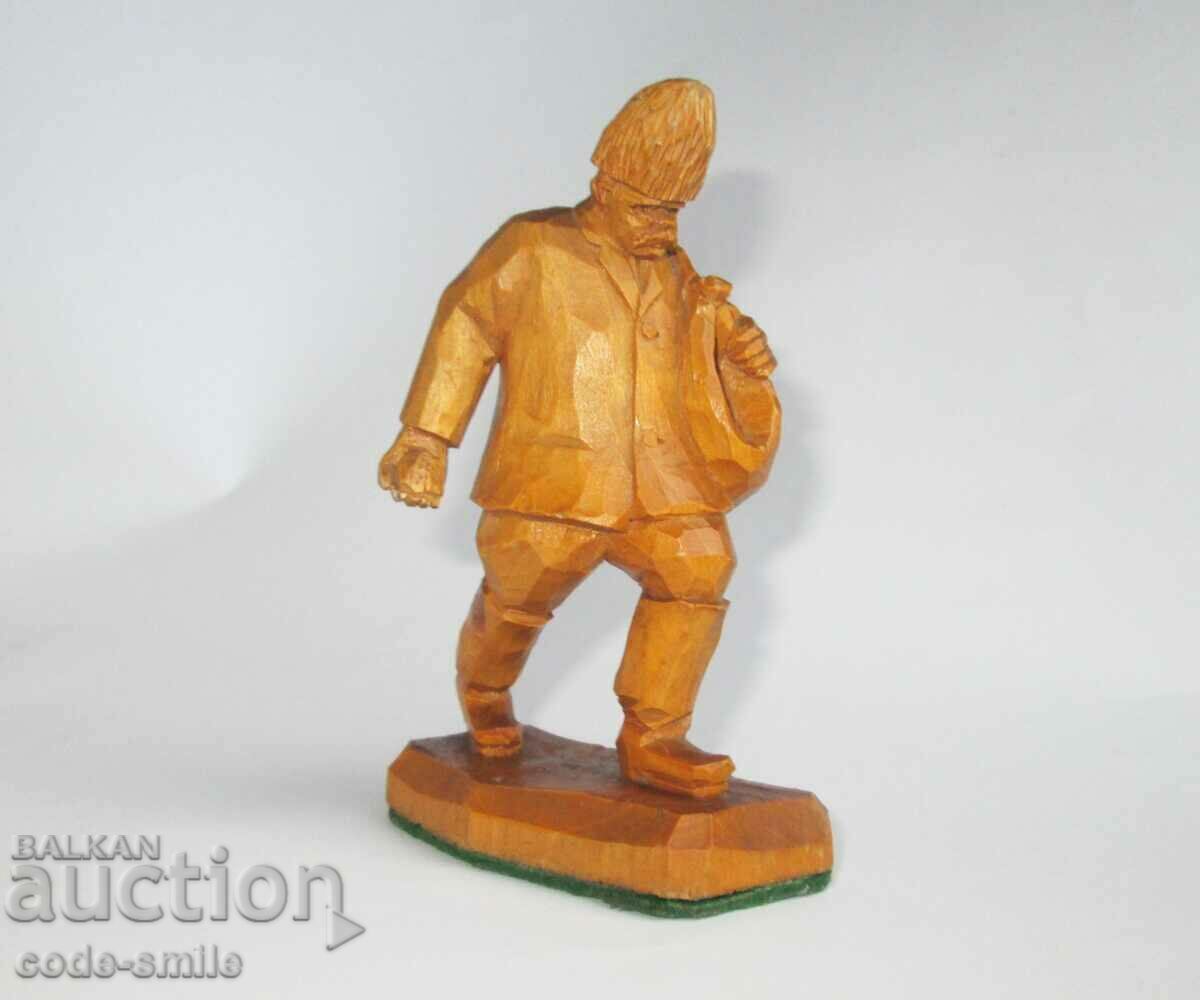 Old author's woodcarving figure statuette Old man sows grain