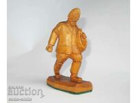 Old author's woodcarving figure statuette Old man sows grain
