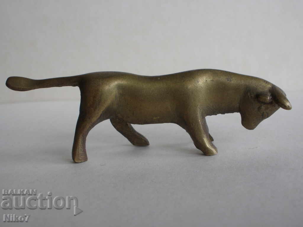 Antique bronze figurine (statue, plastic) of a bull. Antique bronze figurine (statue, plastic) of a bull.