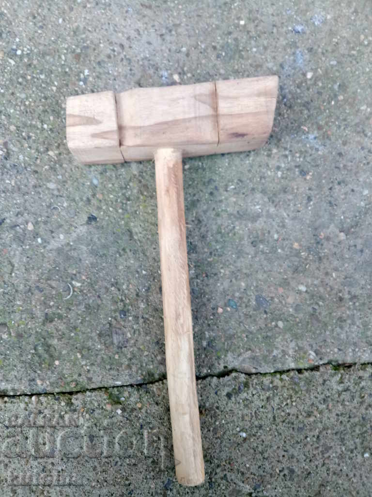 An old wooden hammer