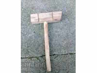 An old wooden hammer