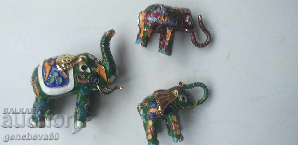 Auction A family of lucky elephants bronze, enamel, cloisonné Auction A family of lucky elephants bronze, enamel, cloisonné