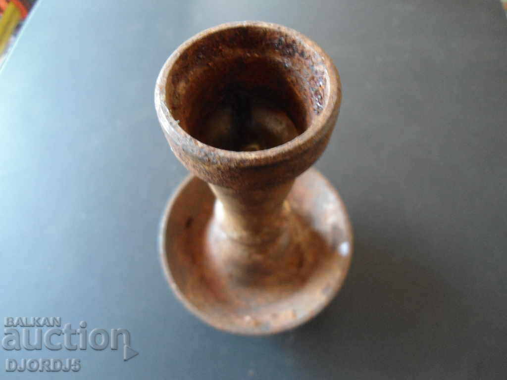 An old metal candleholder with price 4.00 BGN | € 2.05 An old metal candleholder with price 4.00 BGN | € 2.05