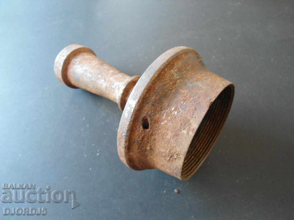 Delivery of An old metal candleholder Delivery of An old metal candleholder