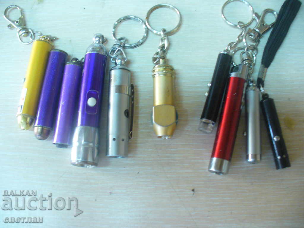 Auction LASER FLASHLIGHTS KEY HOLDERS ETC. Auction LASER FLASHLIGHTS KEY HOLDERS ETC.