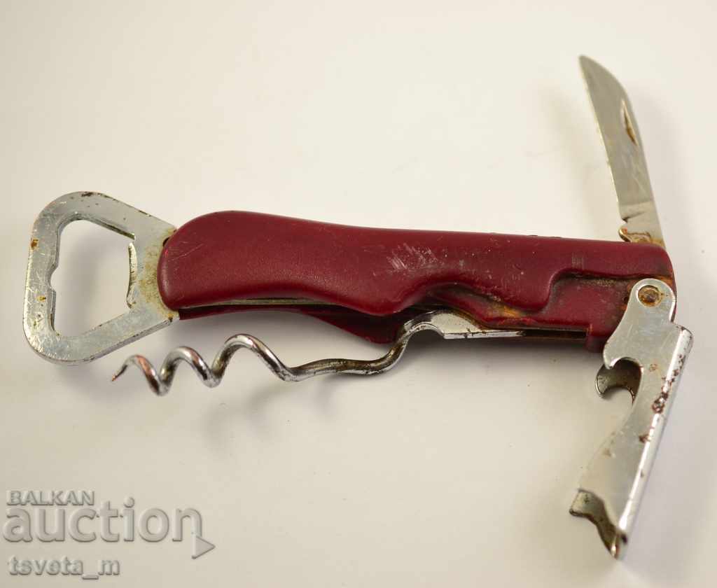 Auction Corkscrew with 2 openers and a knife Auction Corkscrew with 2 openers and a knife