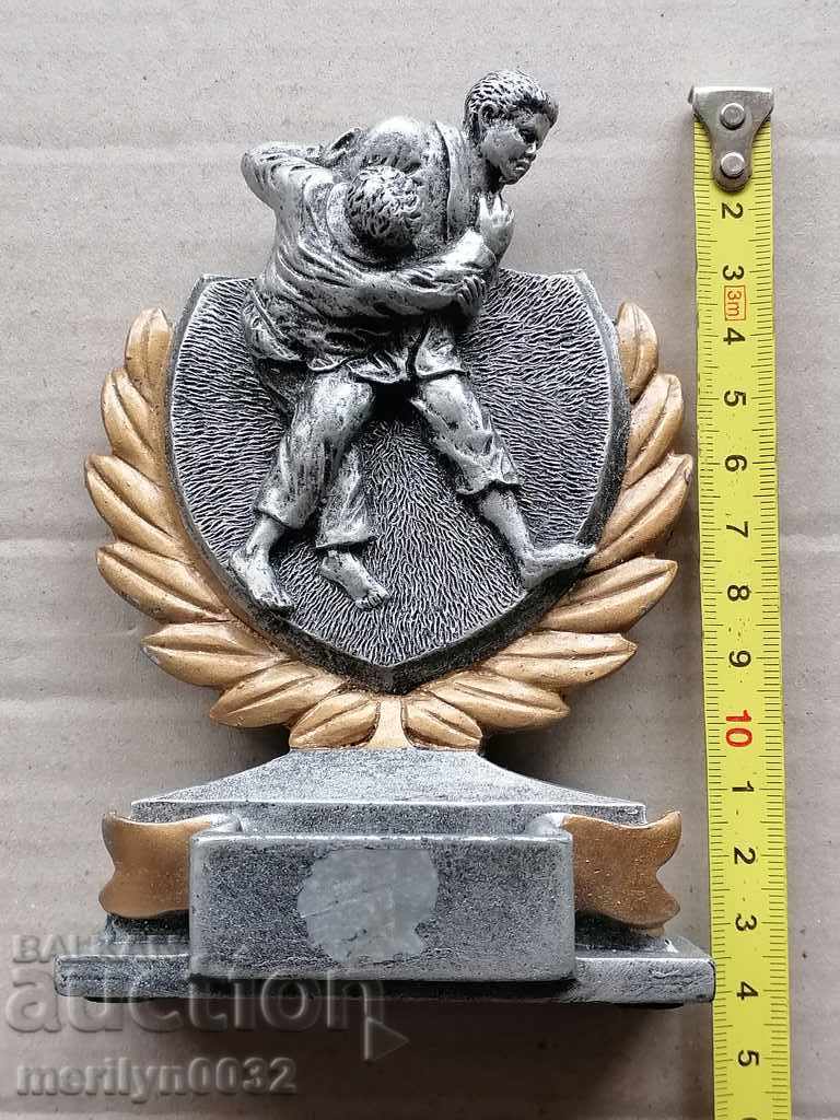 Delivery of Fighting figure, wrestlers plastic, sculpture, award Delivery of Fighting figure, wrestlers plastic, sculpture, award