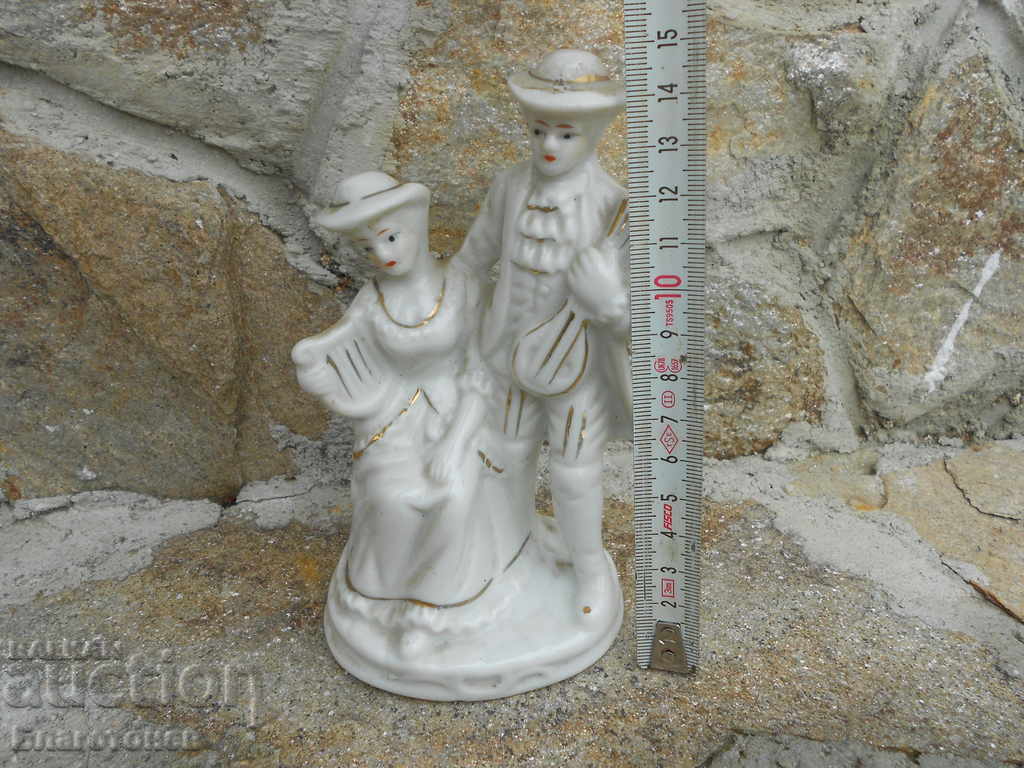 Auction Porcelain statuette Auction Porcelain statuette