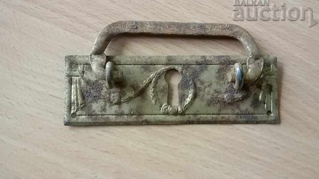 hardware handle from antique chest of drawers