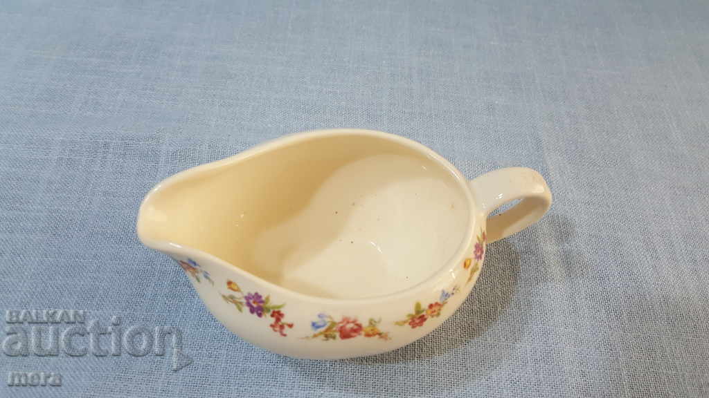 A small porcelain saucer with price 15.00 BGN | € 7.67 A small porcelain saucer with price 15.00 BGN | € 7.67