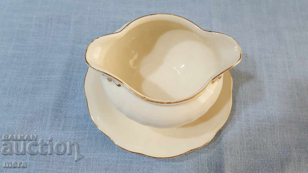 Auction Large porcelain saucer Auction Large porcelain saucer