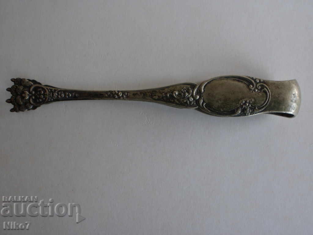 Auction  Beautiful vintage sugar [ice] tongs.