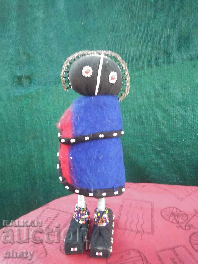 Delivery of An old mannequin doll. African handmade art.