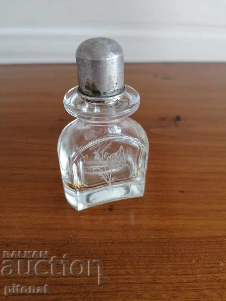 Vintage perfume bottle with silver cap with price 40.00 BGN | € 20.45