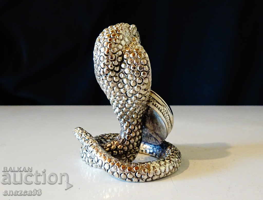 Auction Seiko silver-plated table clock Cobra, Snake. Auction Seiko silver-plated table clock Cobra, Snake.
