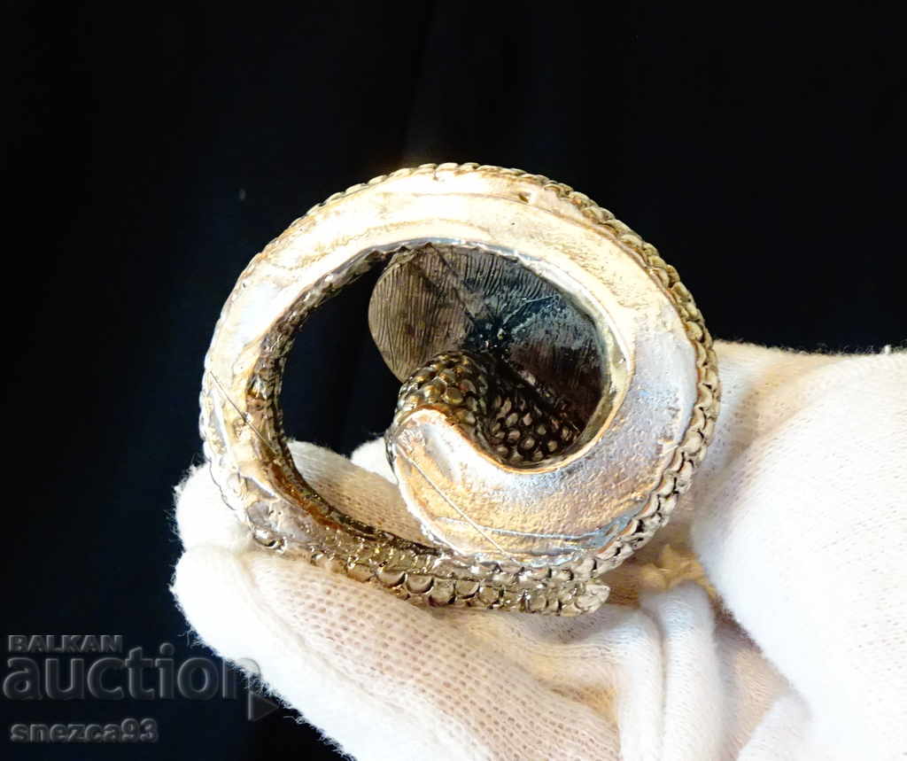 Delivery of Seiko silver-plated table clock Cobra, Snake. Delivery of Seiko silver-plated table clock Cobra, Snake.