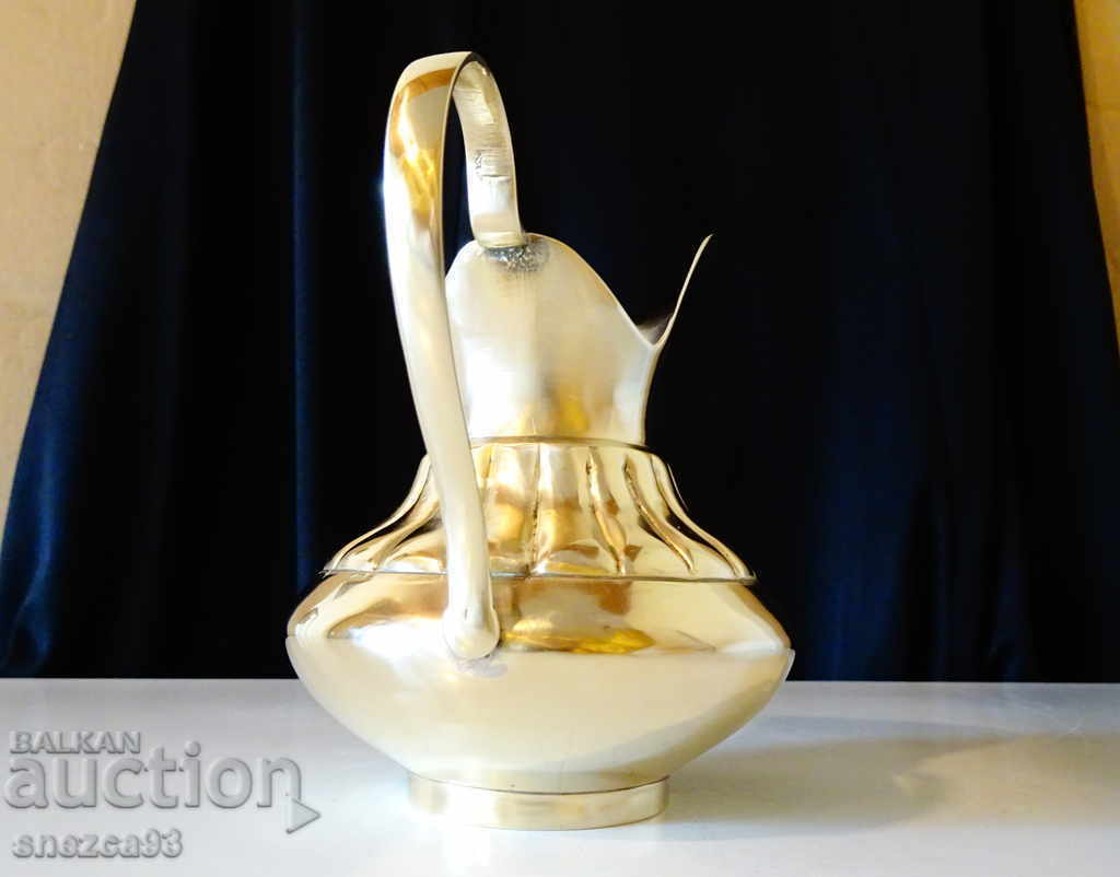 Auction  English bronze jug for wine, rakia, relief