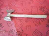 Old Russian hatchet and meat mallet