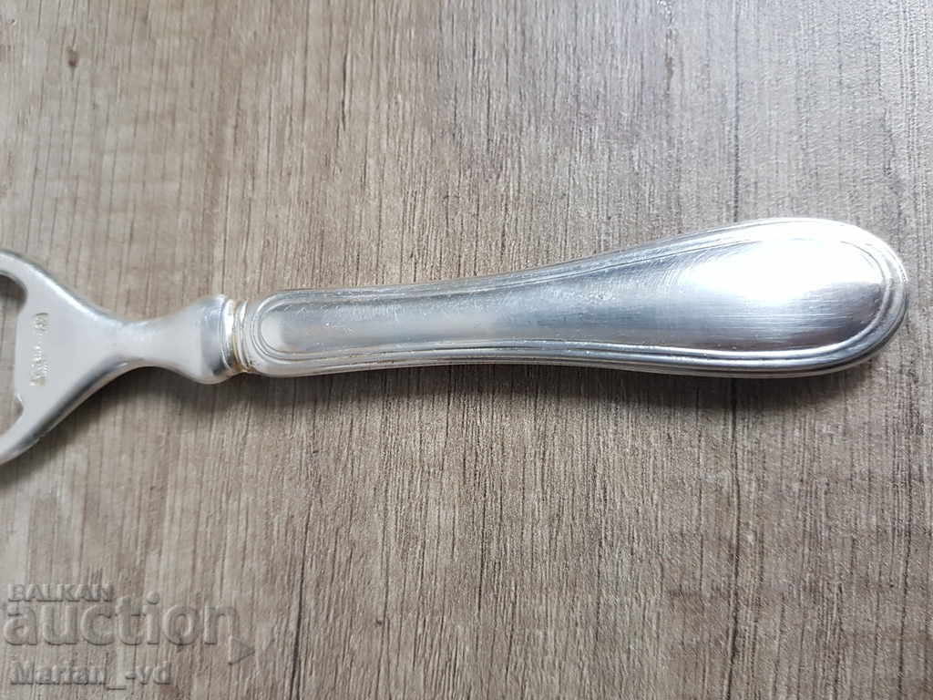 Auction Serrated opener Auction Serrated opener