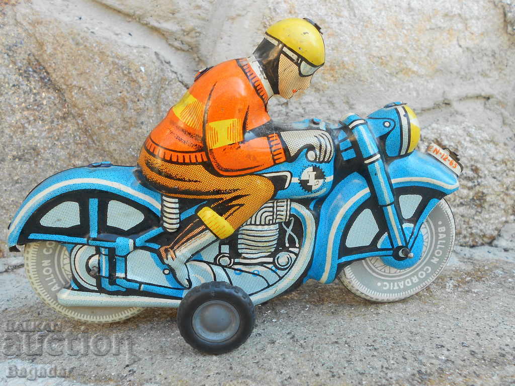 Sheet metal motorcyclist toy with price 25.00 BGN | € 12.78 Sheet metal motorcyclist toy with price 25.00 BGN | € 12.78