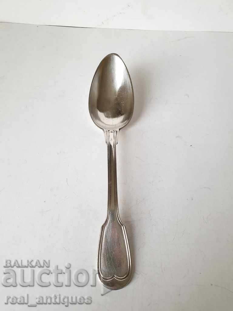 A solid silver spoon