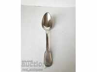 A solid silver spoon