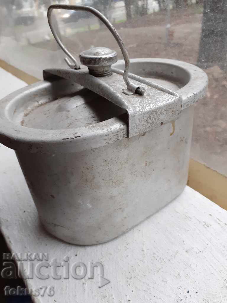 Auction  an old aluminum German Panther food jug