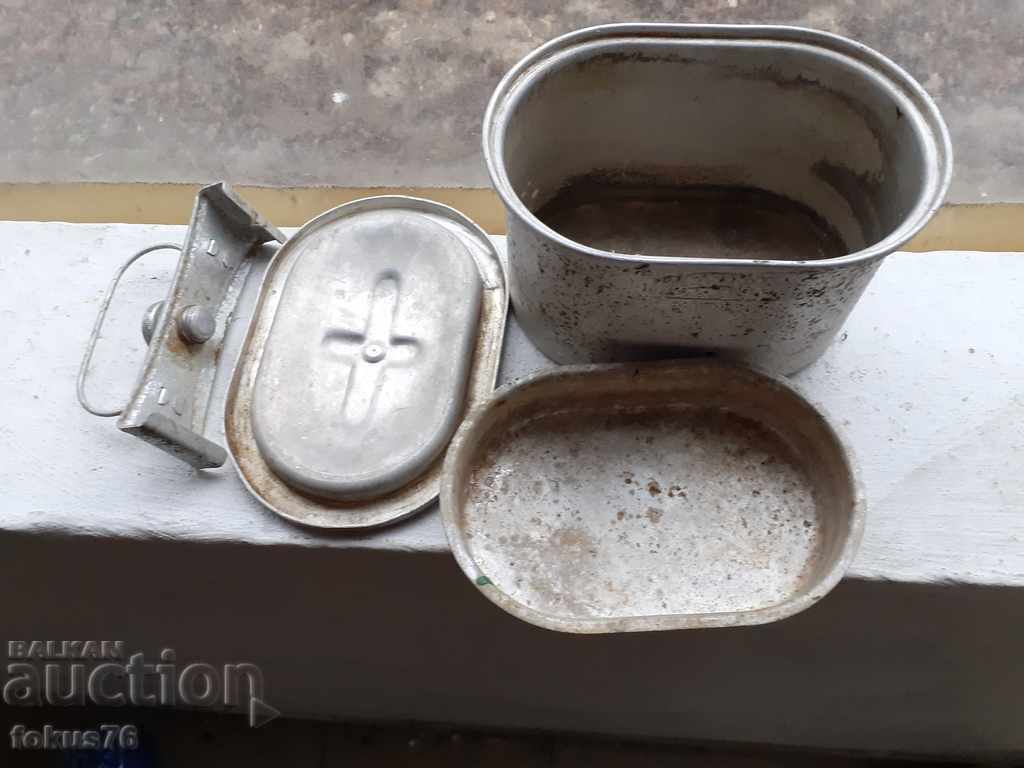 Delivery of an old aluminum German Panther food jug