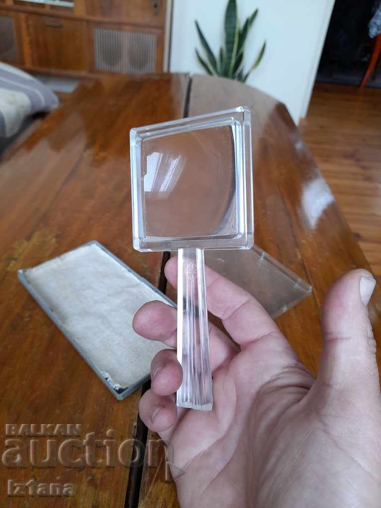 Delivery of Old magnifying glass Delivery of Old magnifying glass